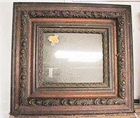 Mirror in Ornate Wooden Frame