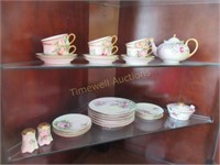 Two co-ordinating hand painted set of china