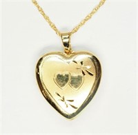 S. Silver Heart Shaped Locket Necklace. Retail