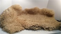 WELL LOVED PIECE OF SHEEP SKIN