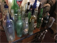 Collection of glass soda bottles