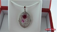Pendant. Oval. Two hearts (created Ruby and