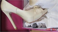Shoes. Size 7.5. Brand Love Color Ivory Satin