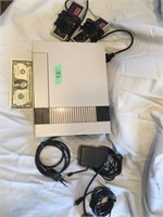 Nintendo Gaming System with controllers & cords