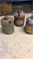 3 small oil cans.