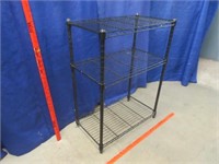 smaller black metal rack (31in tall x 23in wide)