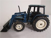 New Holland Cab w/7411 Front Loader