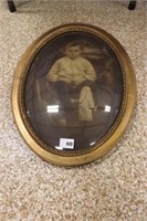 VINTAGE CURVED GLASS FRAME W/PORTRAIT OF YOUNG BOY