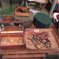 Jewelry box, costume jewelry, round tin