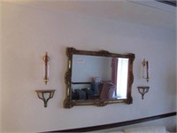Mirror with wall hanging accents