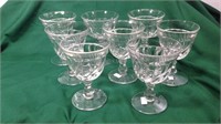 Set of eight crystal glassware