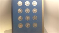 12 sterling silver Zodiac rounds