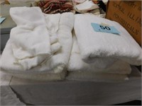 Assortment of white bath towels