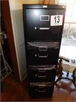 New 4 drawer file cabinet (Missing Key)