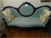Victorian sofa with brass casters