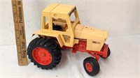 Vintage metal case tractor toy
