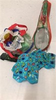 Beach bag with sand toys, bad mitten, arm