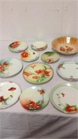 Group of collectible hand painted floral plates