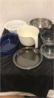 Group of kitchen: pans strainers, bowls and more