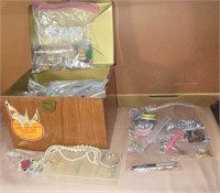 Large box full of costume jewelry including