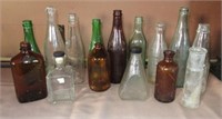 (15) Various vintage bottles including Al Joyce