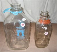 (2) Vintage glass dairy bottles including