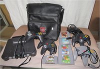 Nintendo 64 gaming console with remotes and (5)