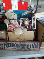 Patriotic items including wood signs, stuffed