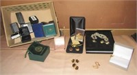 Costume jewelry in boxes including rings,