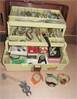Tackle box full of costume jewelry including