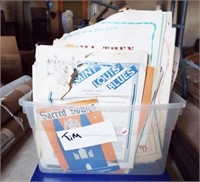 Tote full of sheet music.