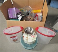 Household items including tins, plastic ware,