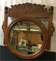 HANGING ROUND WALNUT MIRROR WITH CARVED TOP