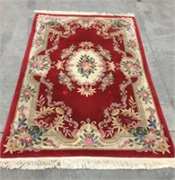 RED FLORAL AREA RUG