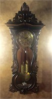 carved wall clock