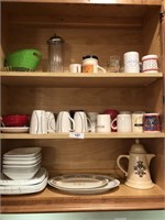 Shelves full of coffee mugs, plates & more