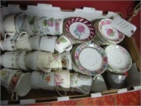 Box of assorted tea cups and saucers