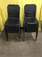 Ten Black Plastic Chairs