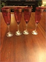 Lot of 4 cranberry and gold crystal champagne flus