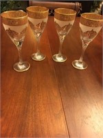 Lot of 4 gold rimmed frosted wine glasses