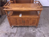 Serving buffet cart  with cabinet on casters