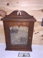 Old wooden wall cabinet with glass panel & shelves