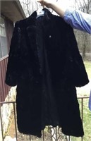 Gender Haugen Fur? Full length black coat