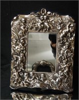 Sterling embossed antique pic frame w cupids