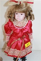PORCELAIN DOLL IN RED DRESS