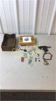 Cap gun, shirt pens, jewelry box, wood box