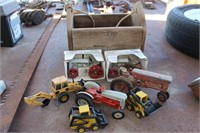 CT- WOODEN BOX WITH 7 TOY TRACTORS