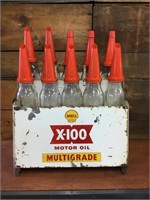 Shell X-100 rack , 10 x oil bottles & plastic tops