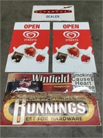 4 assorted plastic signs & 1 tin sign