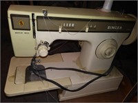 Singer Sewing Machine-Works Needs Adjustments.